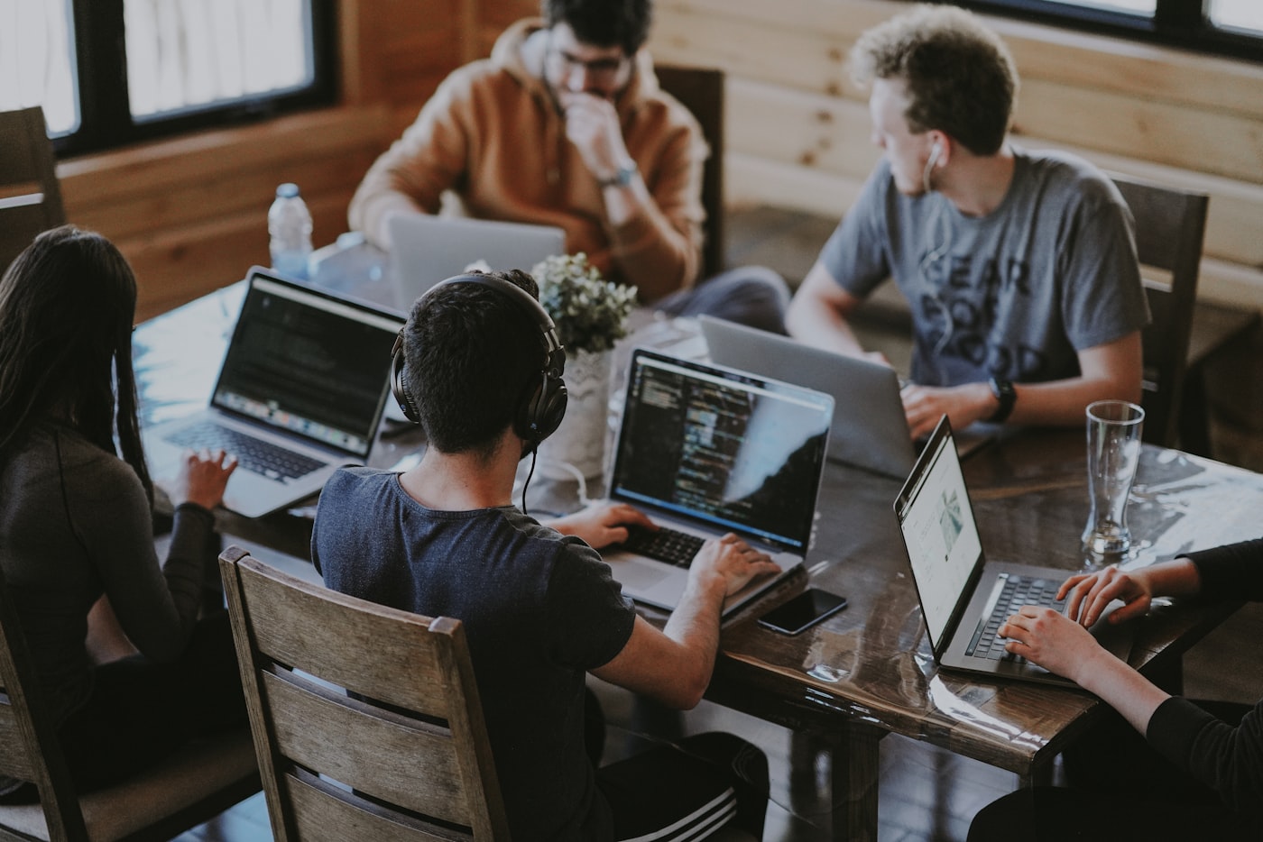 Small-group studio session covering a client service workflow
